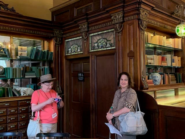 Guests enjoying Victorian-era decor at Solomon's Apothecary